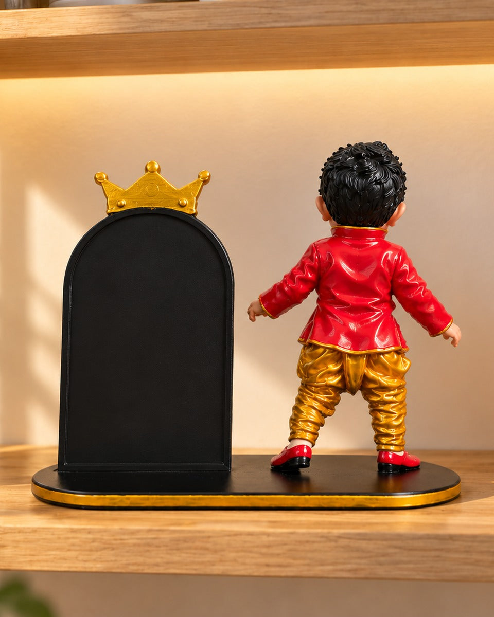 Back view of the personalised baby miniature and black arch photo frame with golden crown on a black and gold base