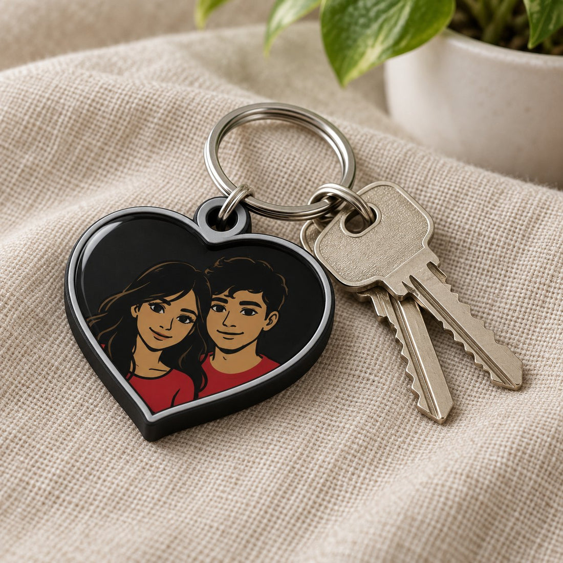 Two personalised photo keychains on a wooden table