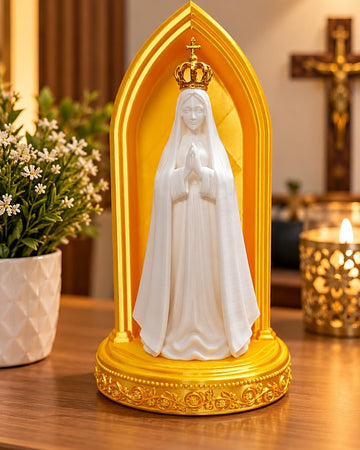Our Lady of Fatima statue in a gold arch shrine with crown